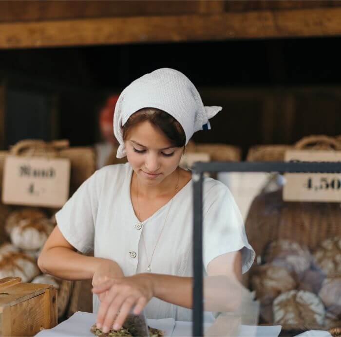 woman slicing bread